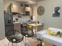 Lovely Rosebank 1-bedroom condo with pool  cinema Tourism Africa